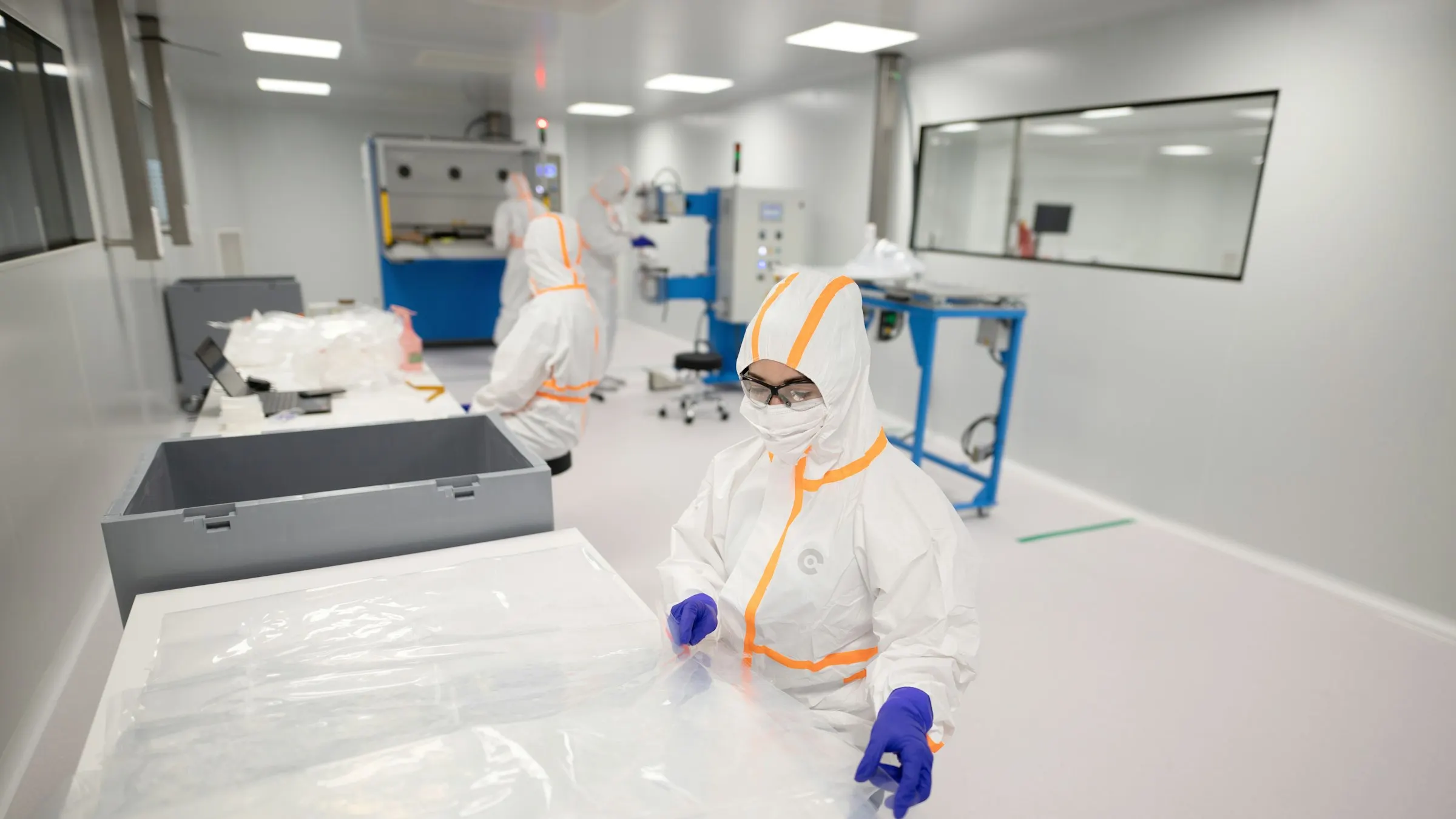 Operator gowned for work in a pharmaceutical clean room